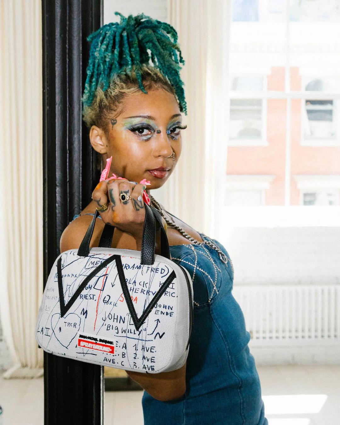 Sprayground OFFICIAL BASQUIAT UNTITLED (CHEESE POPCORN) 1983 HANDBAG