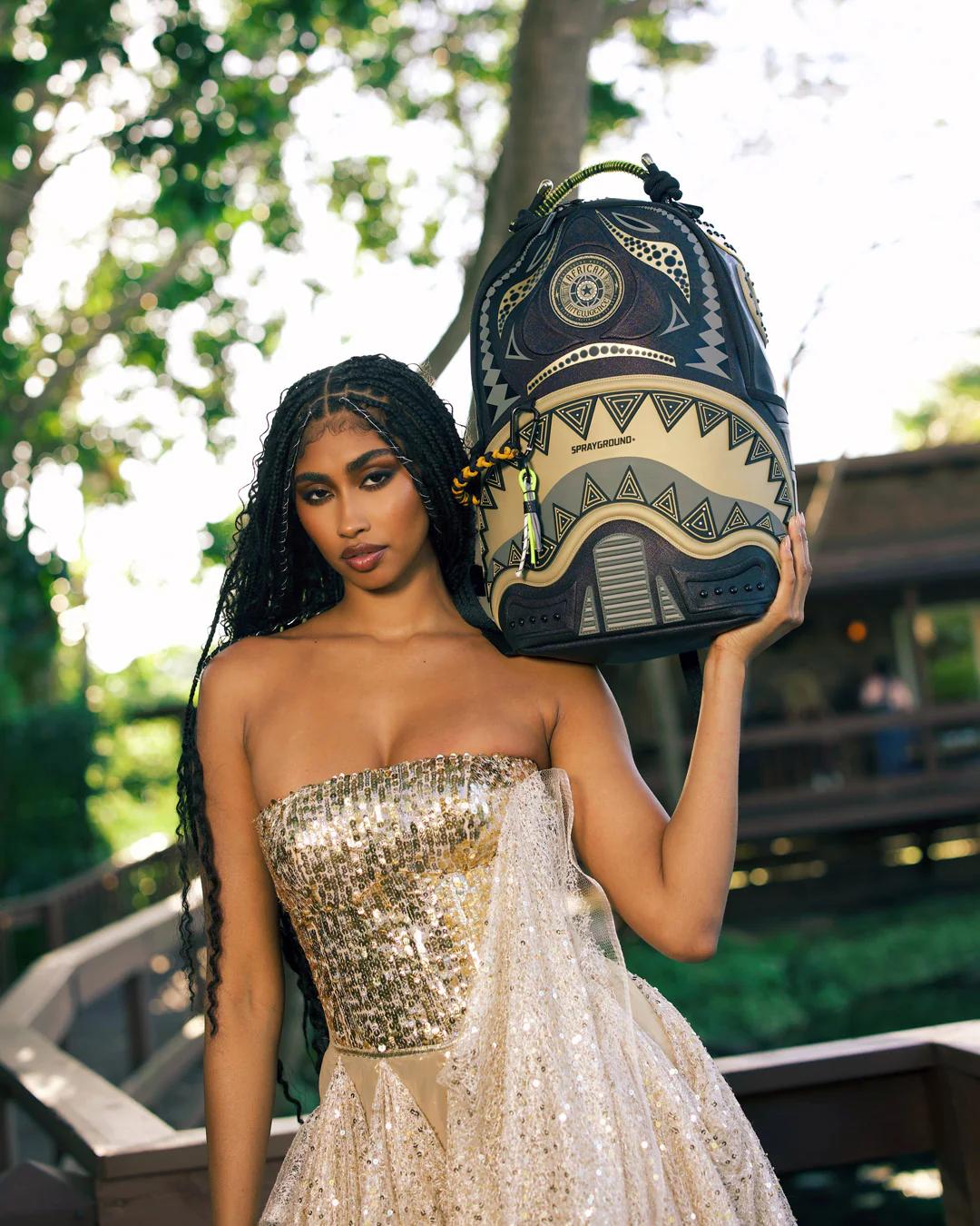 Sprayground A.I. AFRICAN INTELLIGENCE SHARKS OF THE GOLD OCEAN BACKPACK - SANDFLOW