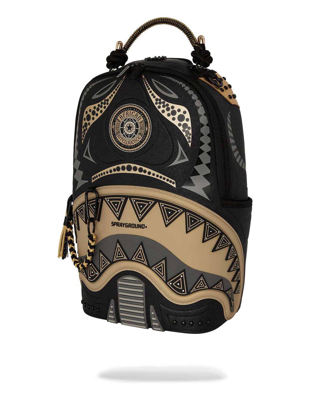 Sprayground A.I. AFRICAN INTELLIGENCE SHARKS OF THE GOLD OCEAN BACKPACK - SANDFLOW