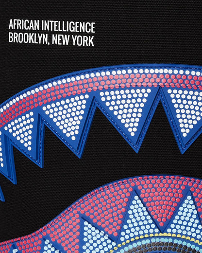 Sprayground A.I. AFRICAN INTELLIGENCE BORN AND RAISED BACKPACK - SANDFLOWER COLLAB