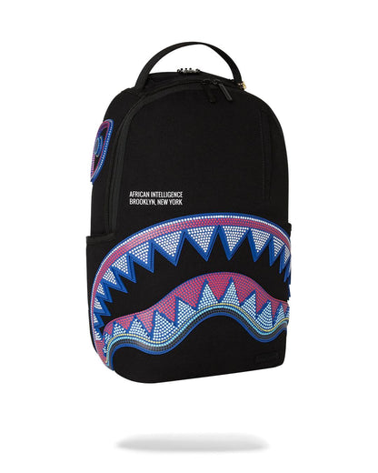 Sprayground A.I. AFRICAN INTELLIGENCE BORN AND RAISED BACKPACK - SANDFLOWER COLLAB