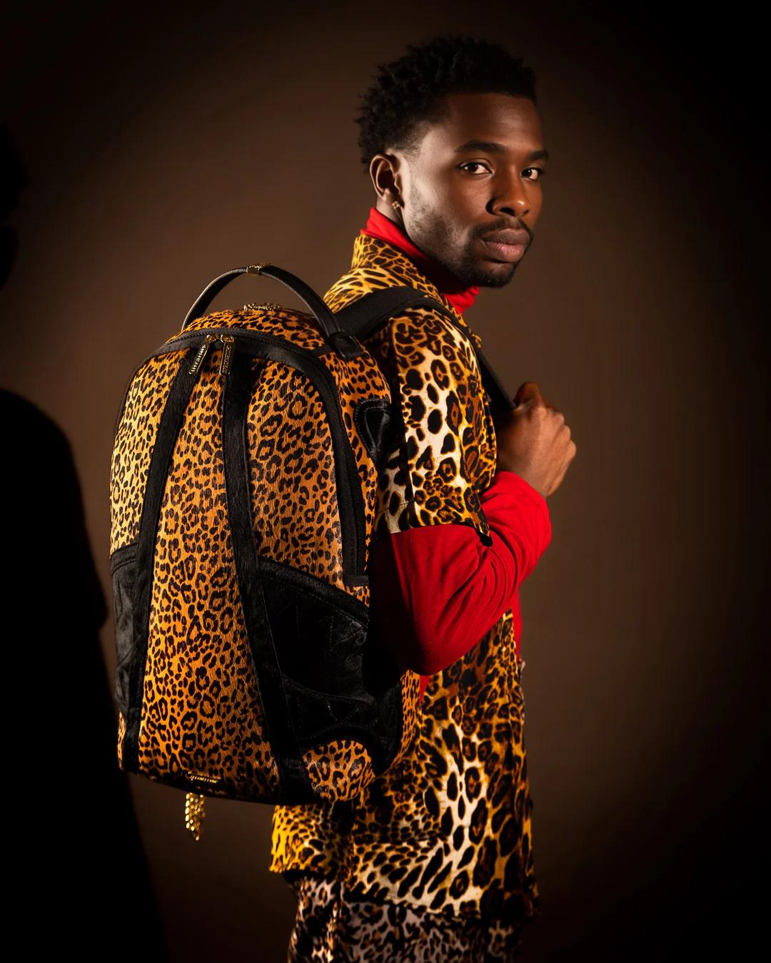 Sprayground AFRICAN INTELLIGENCE 9 COURAGE LIVES ON BACKPACK - SANDFLOWER COLLAB