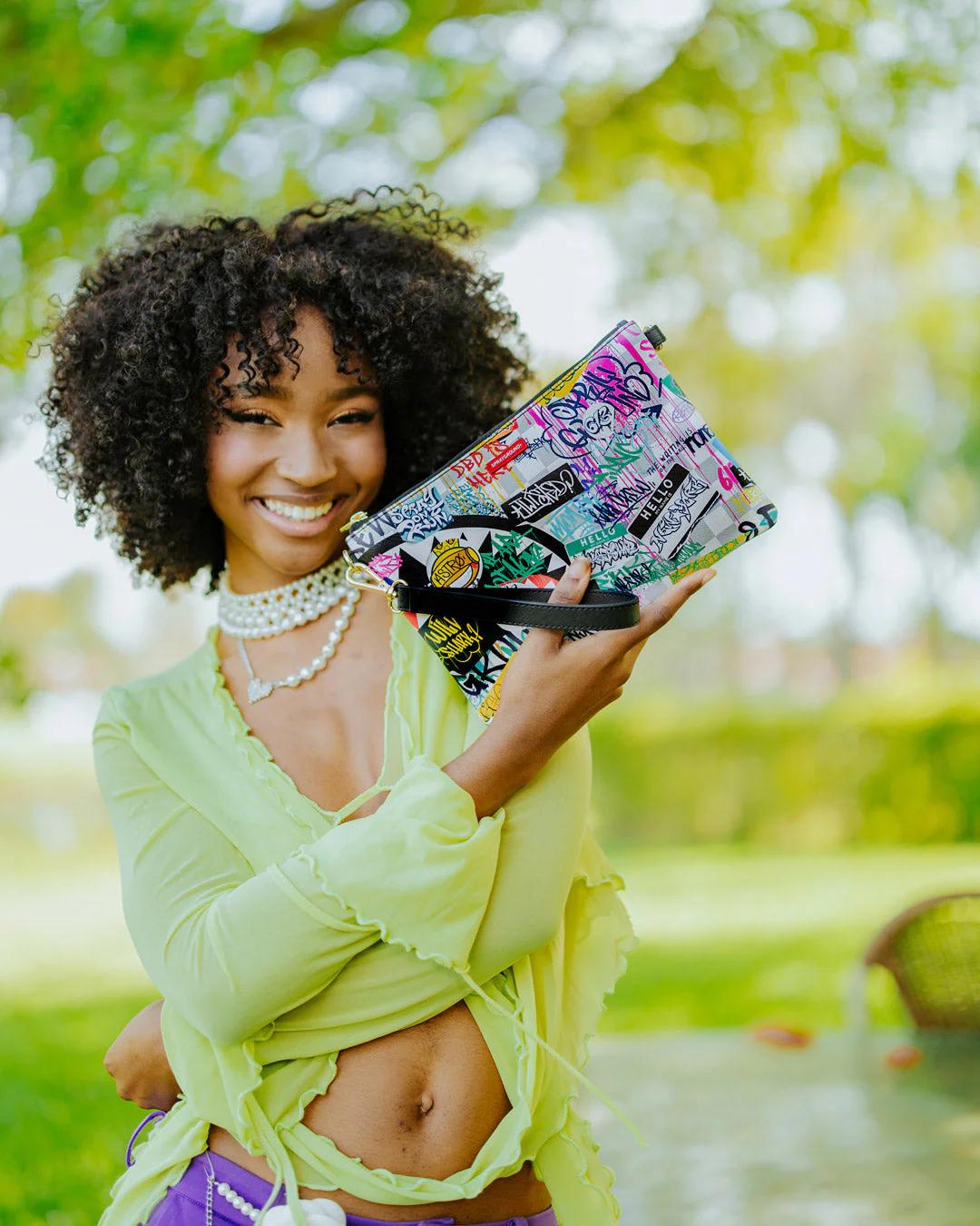 Sprayground CREATE ANOTHER DAY CROSSOVER CLUTCH W/ SHOULDER STRAP