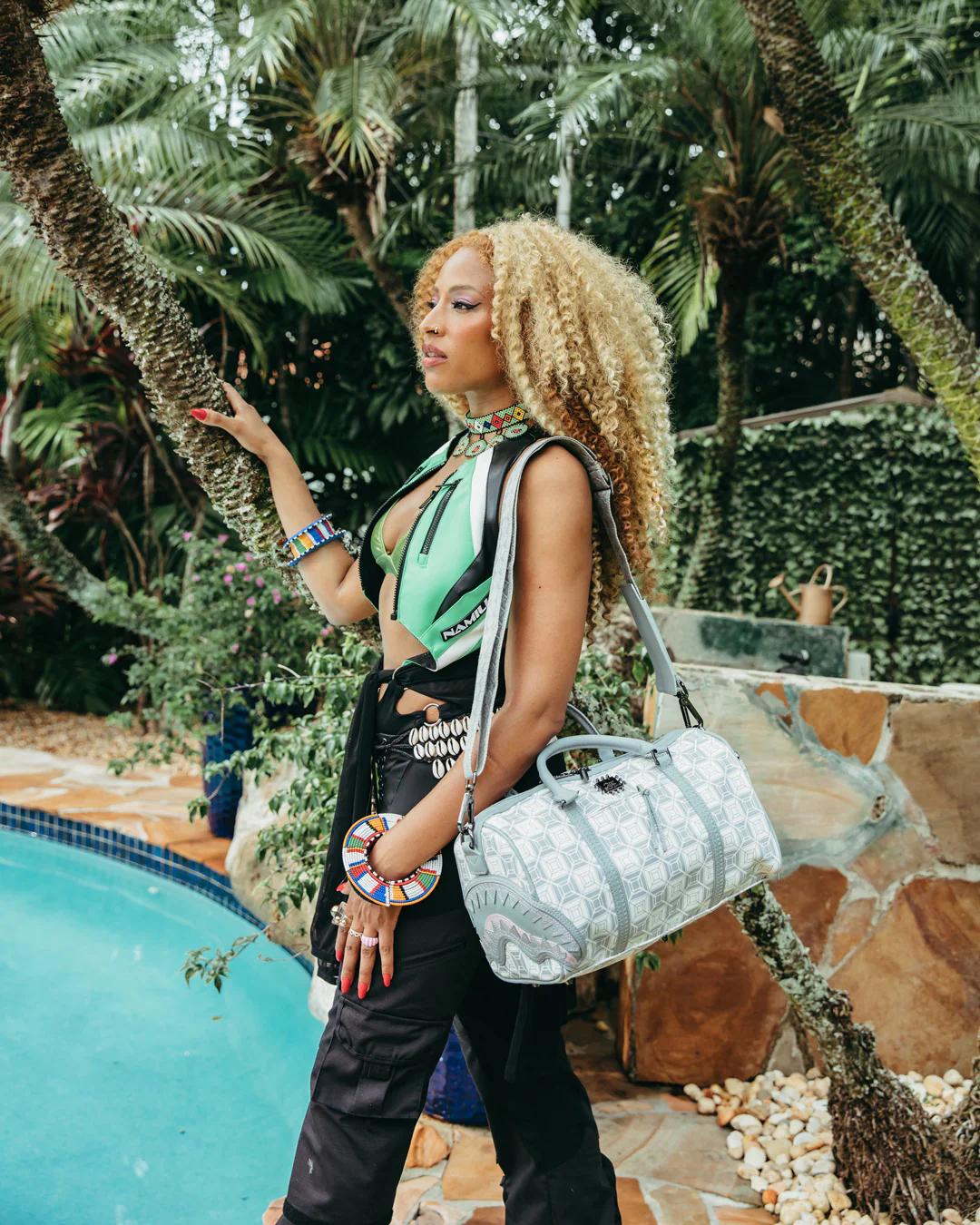 Sprayground A.I.8 AFRICAN INTELLIGENCE BOOKED & BUSY MINI DUFFLE
