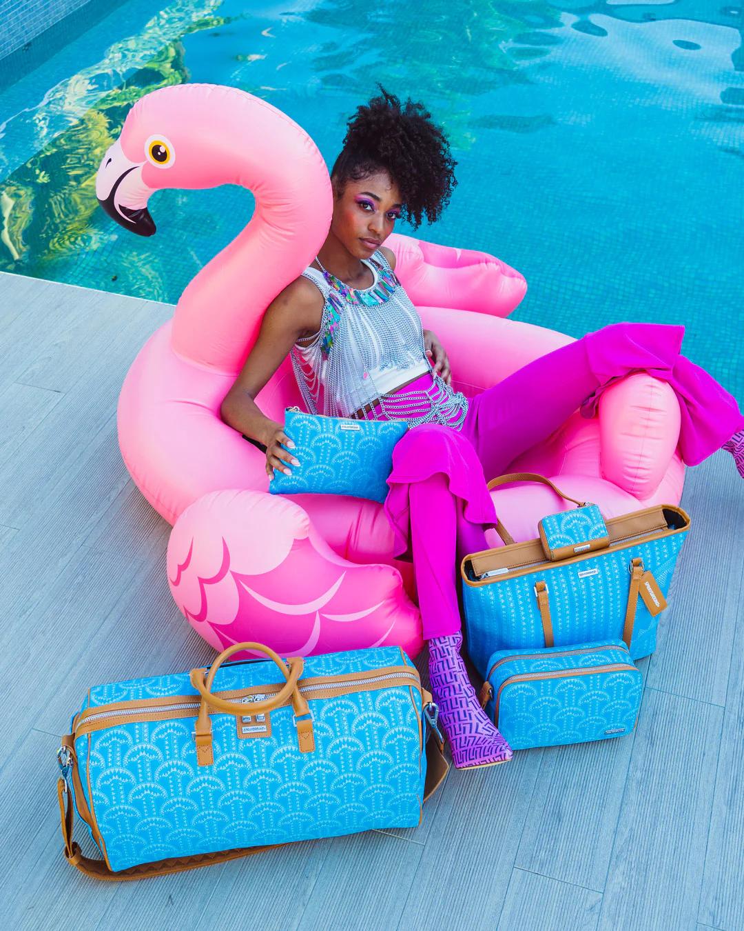 Sprayground ILLUCHAINS TURQ CROSSOVER CLUTCH