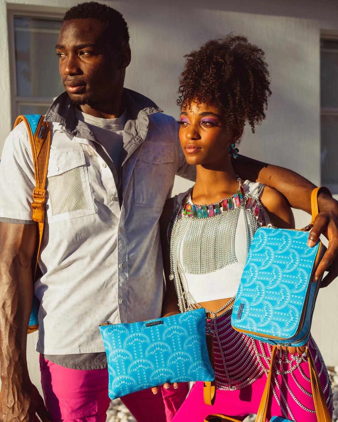 Sprayground ILLUCHAINS TURQ CROSSOVER CLUTCH