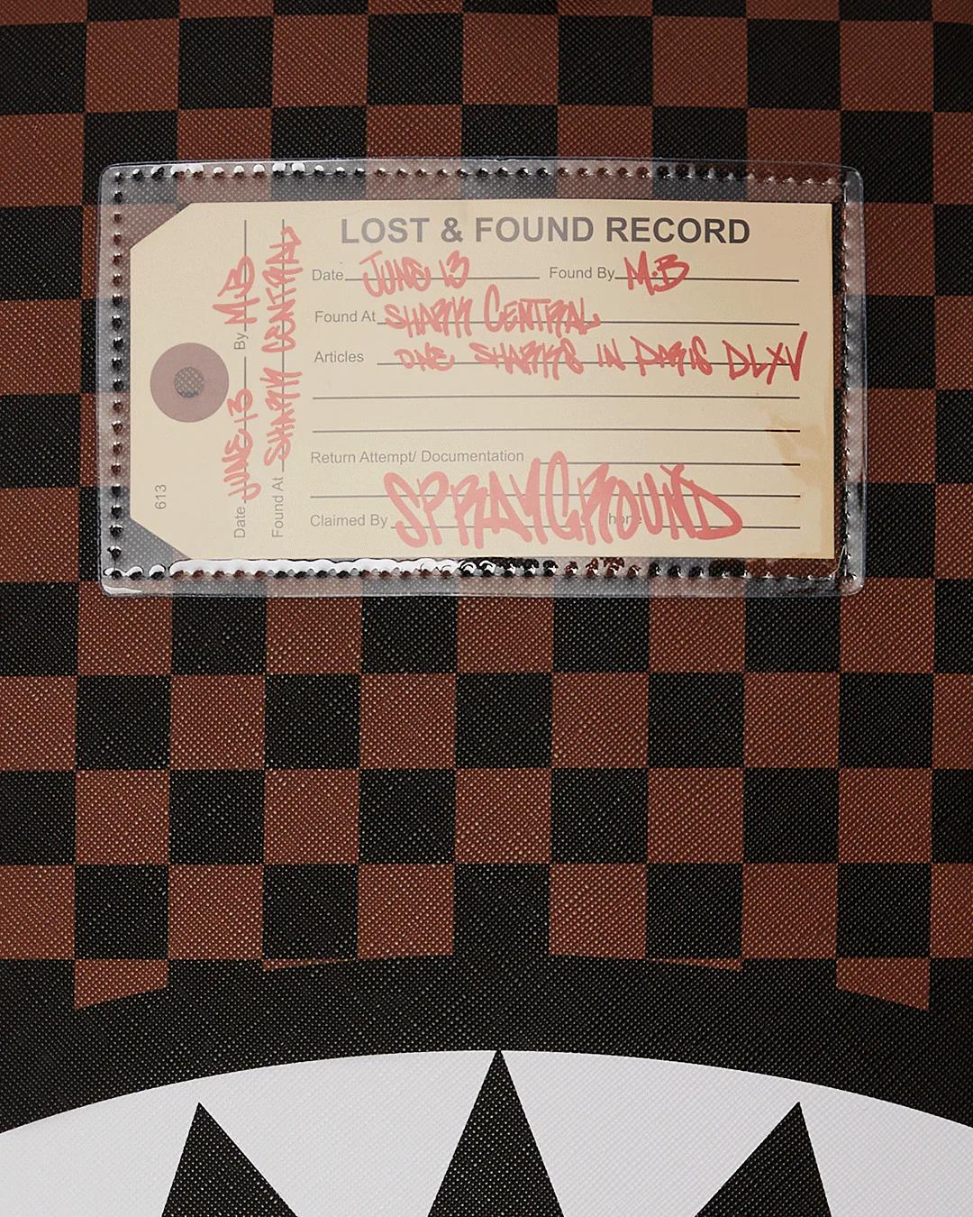 Sprayground SHARKS IN PARIS LOST & FOUND BACKPACK